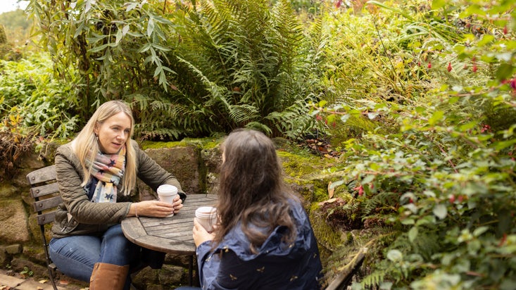 Visitors cosy up with a hot drink at the Killerton Kitchen Café, Killerton, Devon
